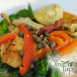 Chicken breast topped with roasted red pepper strips and capers, served with artichoke hearts and sautéed greens in a light sauce.