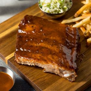 These ribs are moist, tender and so easy to make. They are absolutely delicious with our Bourbon Bacon Barbeque Sauce!