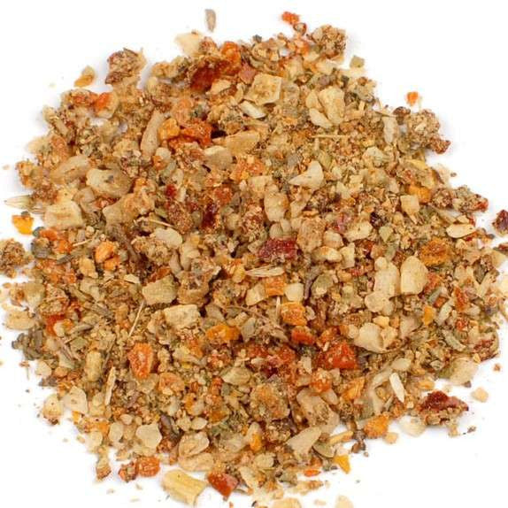 All Purpose No-Salt Seasoning from The Olive Tap: a pile of white, red, orange, green, and brown spices of different sizes on a white background.