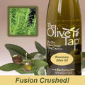 A bottle of Rosemary Olive Oil from The Olive Tap next to olives and leaves with an inset showing fresh rosemary and the words "fusion crushed!" at the bottom of the picture.