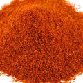 Smoked Spanish Paprika from The Olive Tap: a pile of red paprika on a white background.