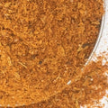 Fajita Seasoning from The Olive Tap: A metal bowl with red ground spices.