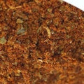 Salt-Free Chicken Seasoning from The Olive Tap: Brownish-red ground spices with green and tan pieces mixed in.