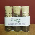 Smoke Sea Salt Trio from The Olive Tap: Three glass bottles of smoked sea salts, sealed with corks.